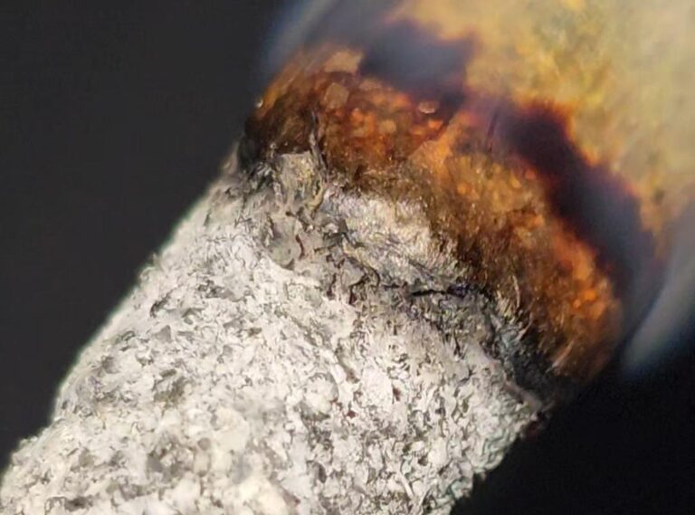 WHITE BURNING ASH ON JOINT